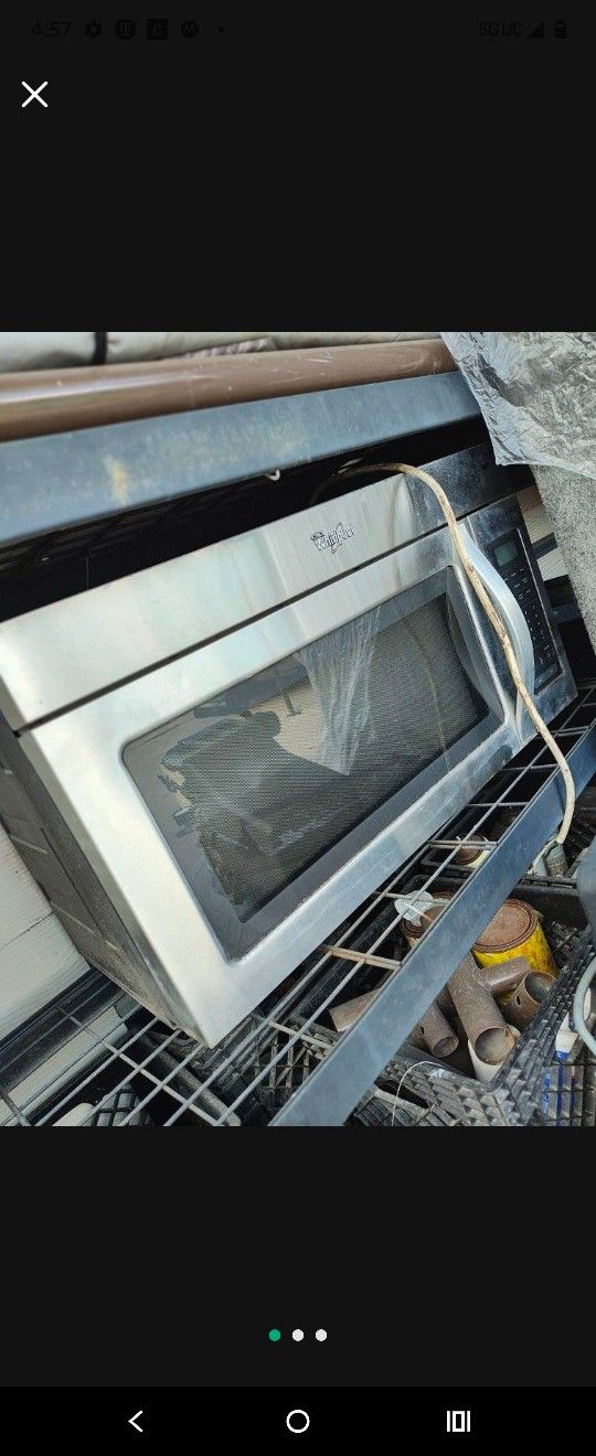 Used Working Stainless Microwave With Exhaust Fan Hangs Over Oven $50