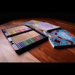 Adult Coloring Books And Colored Pencils 