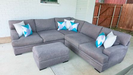Cindy Crawford dark gray sectional