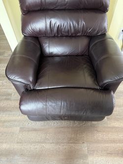 Recliner - brown leather, electric, wall hugger