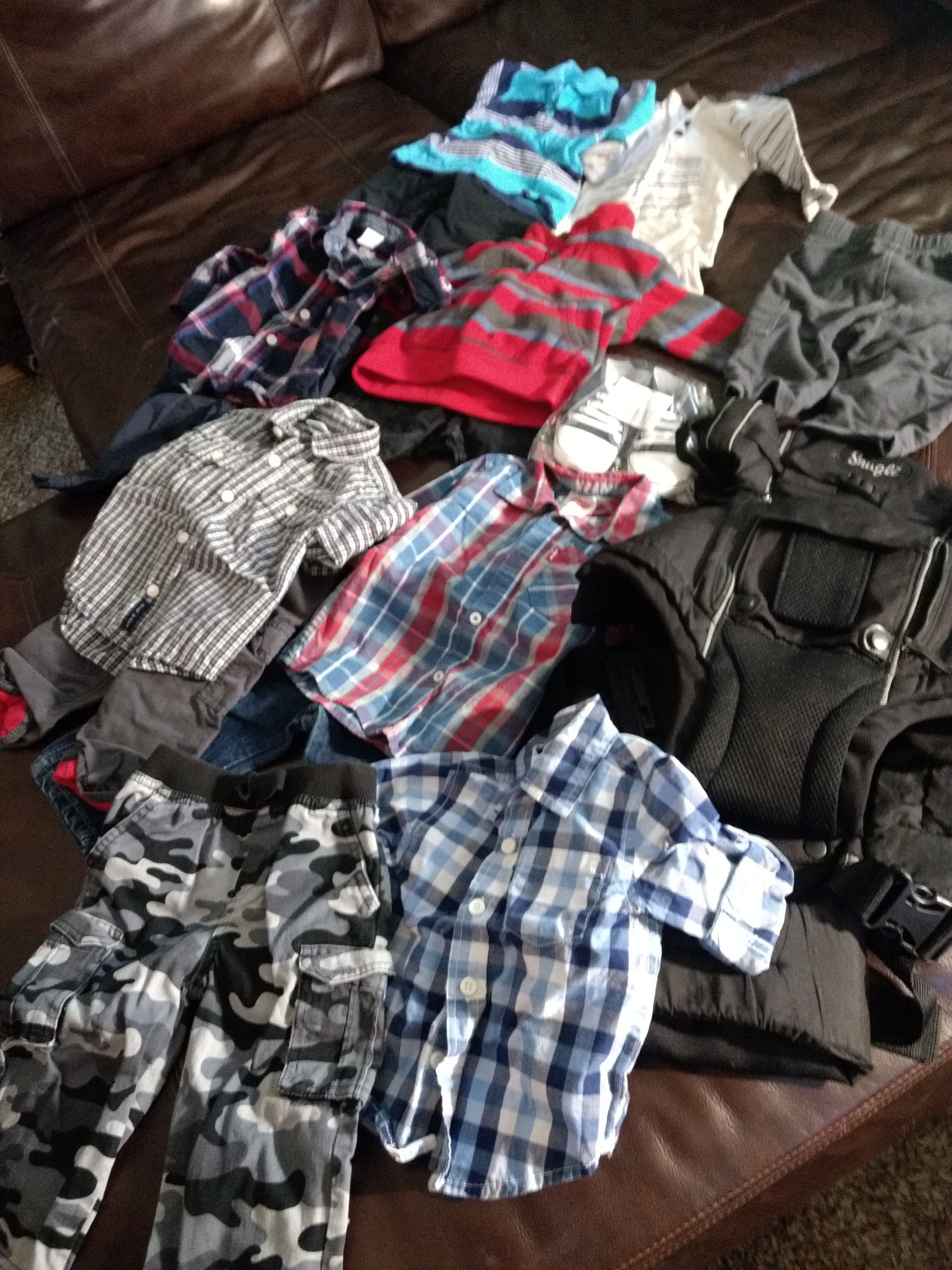 $40 takes all near new Quality & name brand baby clothes, Snuggie and shoes. Boys 12 to 18 months.