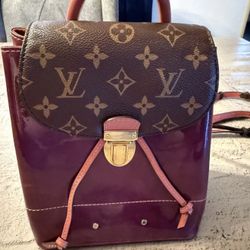Authentic Louis Vuitton Hot Springs Backpack.