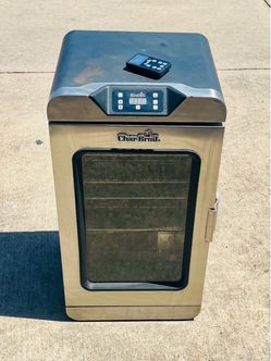 Char-Broil Digital Electric Smoker Char-Broil Digital Electric Smoker, featuring a stainless steel door, digital control panel at the top, & a remote