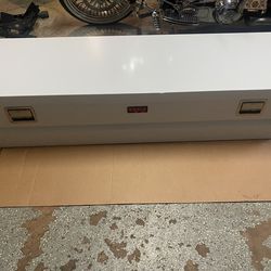 Crossover tool box for truck bed