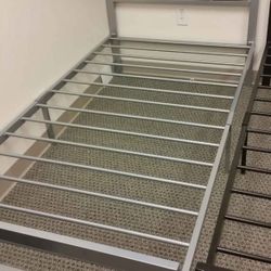 Brand new Twin Size silver metal platform bed frame.