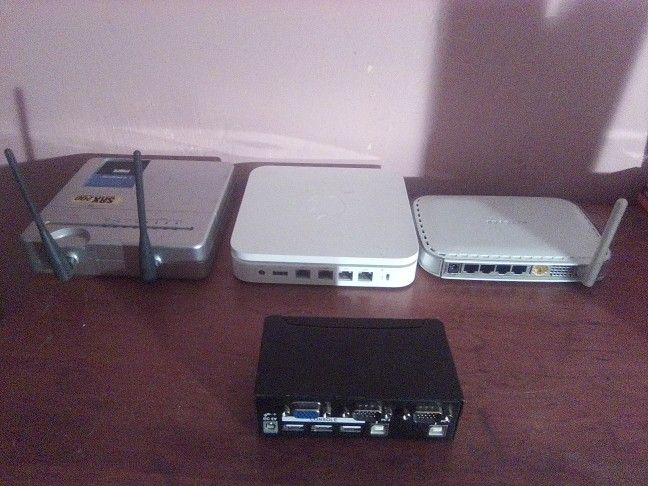 3 Wireless Routers And One Hub Switch