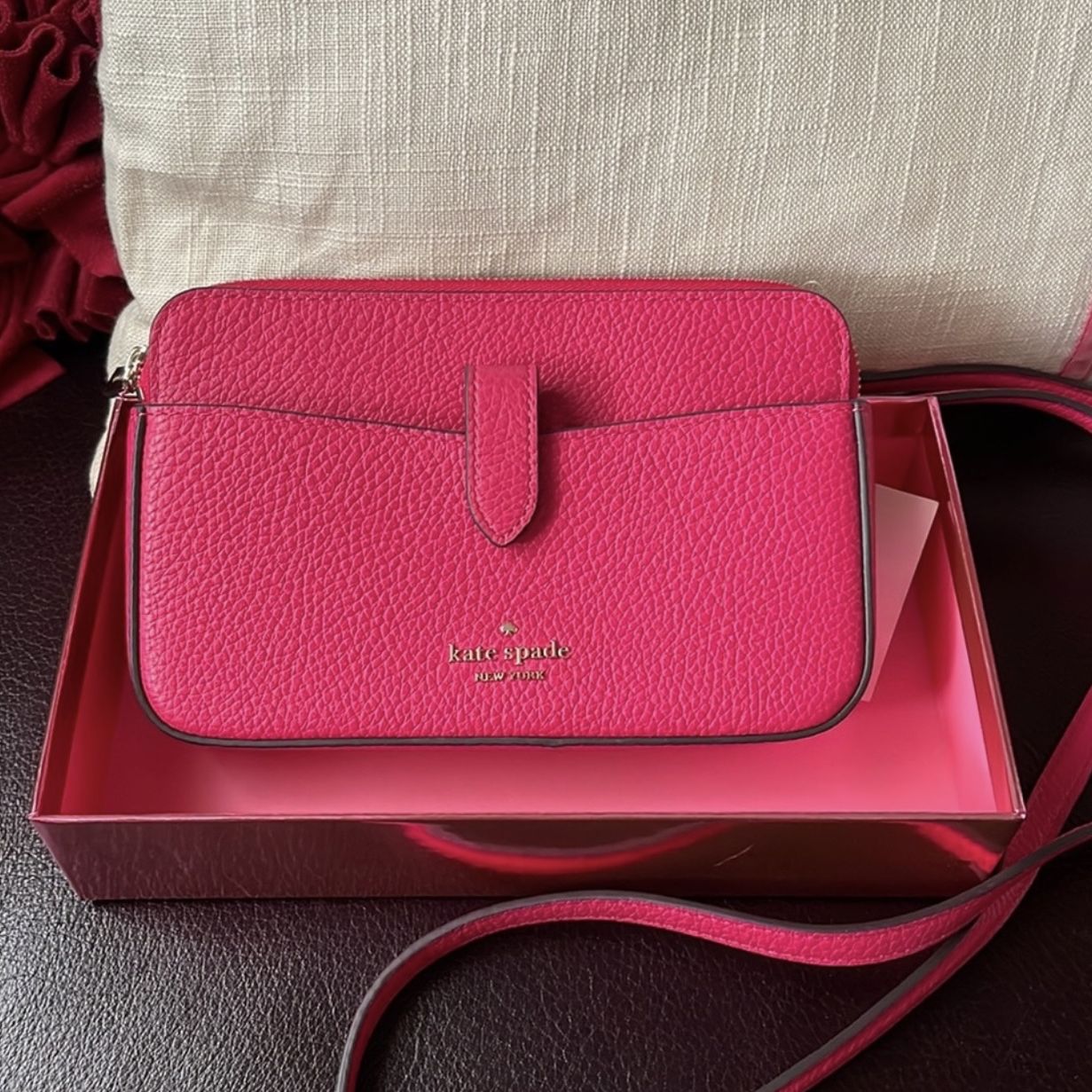 Kate spade new york jackson small 2025 tab leather crossbody bag