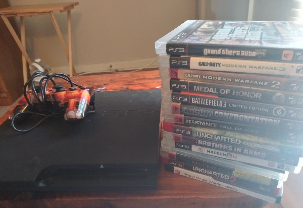 PS3 with one Controller and 14 game's