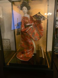 Vintage doll in case