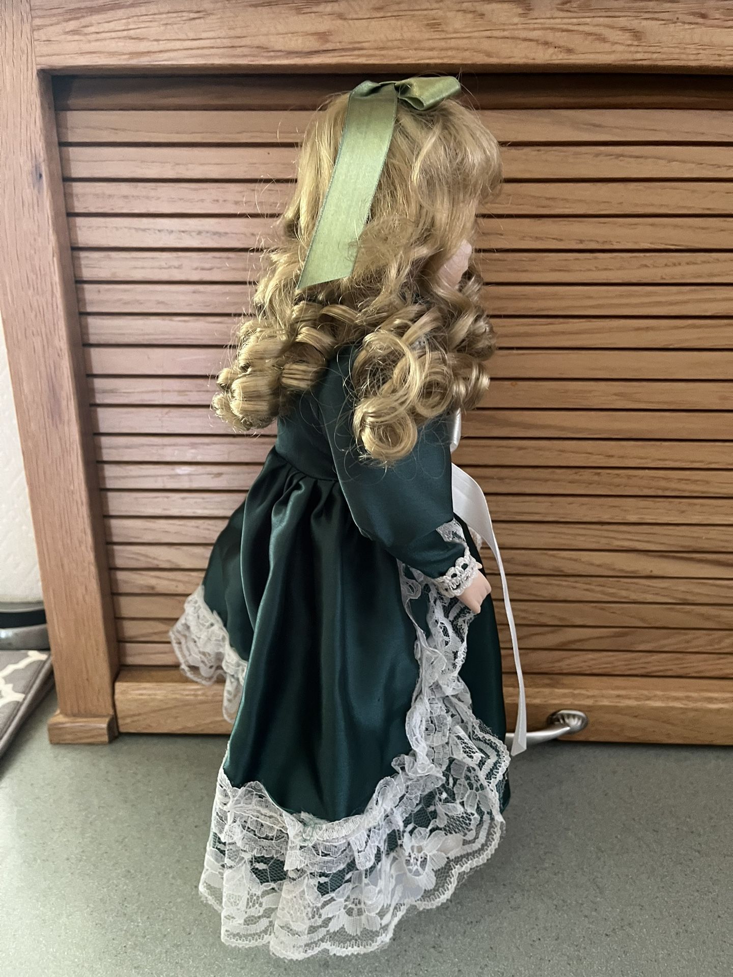 green emerald velvet dress Vintage porcelain doll with green dress and chair 29769 main image 1