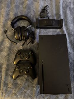 Xbox Series X with controllers, dual charging Dock v2, and hyperx cloudx headset