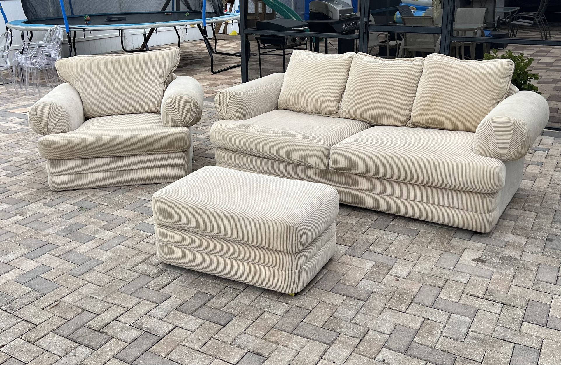 Beige couch, love seat and ottoman. Still in good condition. I can deliver for an additional cost. The price is $200