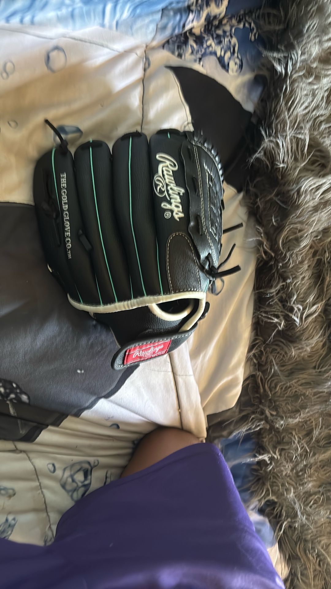 Rawlings black glove PROS series teal stitching basket web