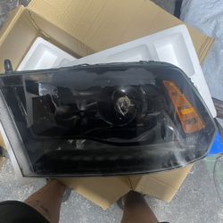 BOTHH!!!2014 ram Headlights!!! Great Condition Need Gone ASAP 