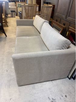 Sofa in a light gray fabric -