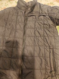 The North Face color negro