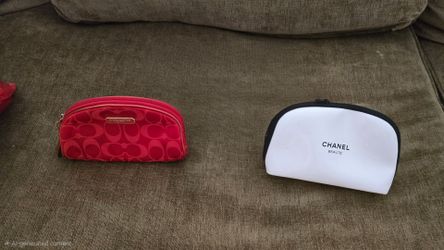 Chanel and Coach Makeup bags