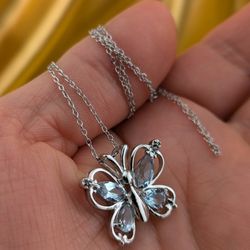 Genuine Blue Topaz Sterling Silver Butterfly Pendant
