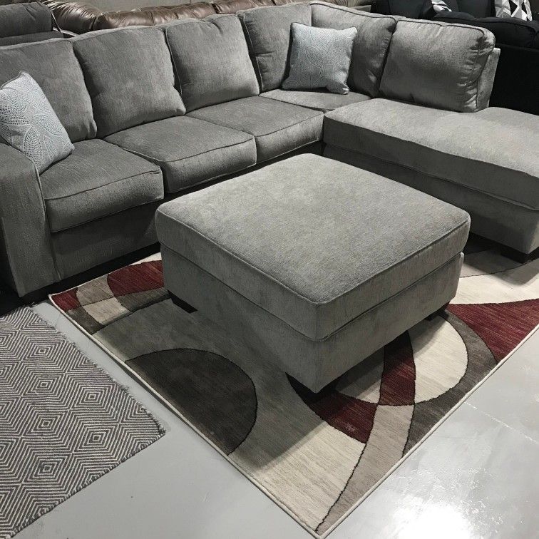 Gray 2 Piece Sleeper Sectional with Chaise by Ashley furniture 