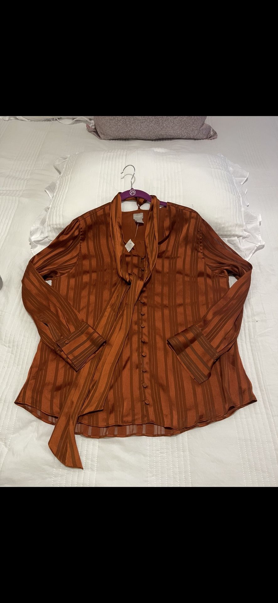 Chicos Blouse Size 2, But it runs big like a size Large, with a beautiful design on the neck, new Never Used