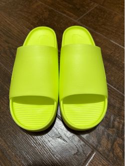 Nike lemon-lime Calm Slides, men’s size 12.