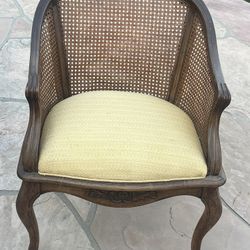 Vintage French Louis XVI Cane Back Bergere Chair With Carved Wood Details