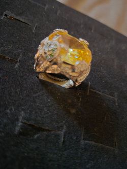 Large yellow topaz stone ring adored with a turtle