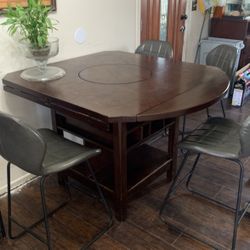 tall dinning table with 4 chairs