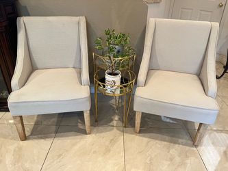Pair of Medallion Pattern Accent Chairs/ tables  and plants not included