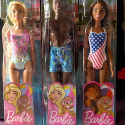 Swimsuit Barbies And Ken Dolls