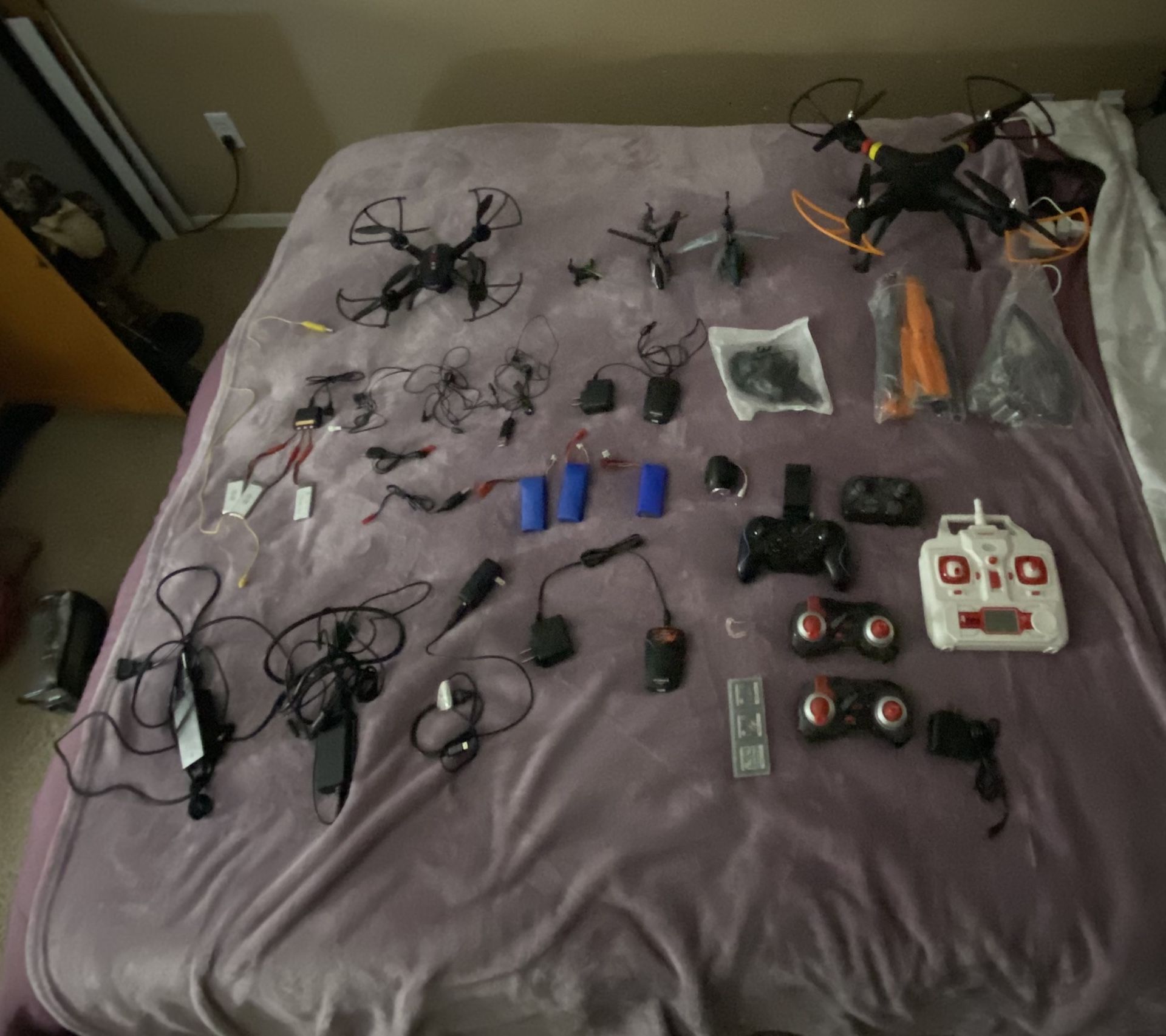 3 Drones And 2 Helicopters And Chargers And Extra Batteries