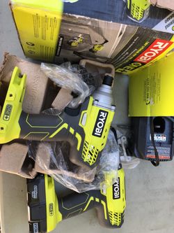 New impact and drill with battery and charger and bag