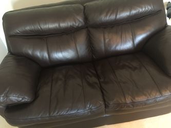 very nice brown leather loveseat