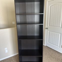 Display books, mementos and pictures in style with the 5-Shelf Bookcase. Standing at about 71 inches high, this wood-finish bookshelf comes with five 