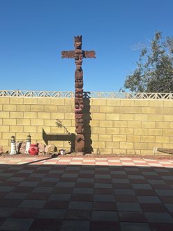 Carved wooden totem pole