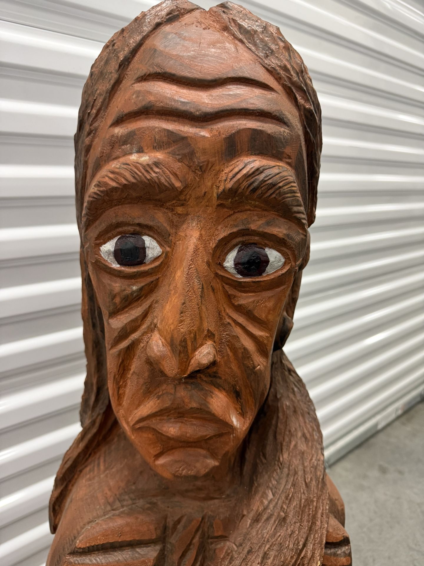 Hand-Carved Wooden Bust Sculpture – $60