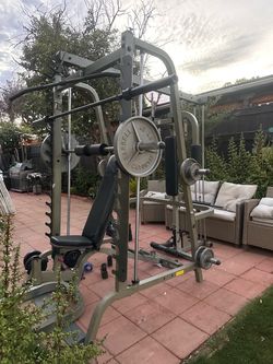 OLYMPIC SQUAT RACK SMITH MACHINE WITH OLYMPIC WEIGHTS AND BENCH
