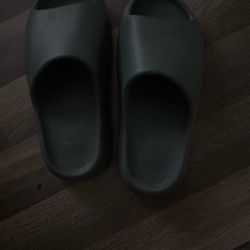 Old yeezy slides with the adidas logo