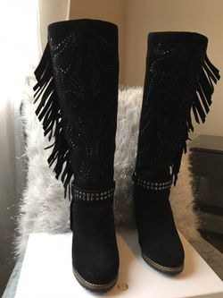 Genuine suede boots with studs design and fringe. Size 6.5. 3” heel covered with suede