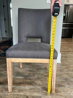 Set of four fabric dining chairs.