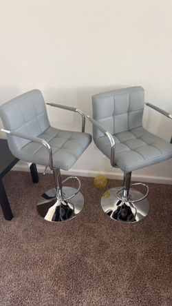 4 light gray tall/bar chairs