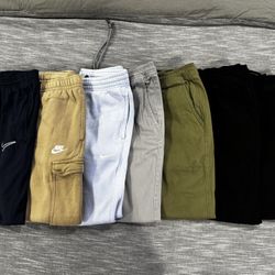 lot of men pants and sweat pants 