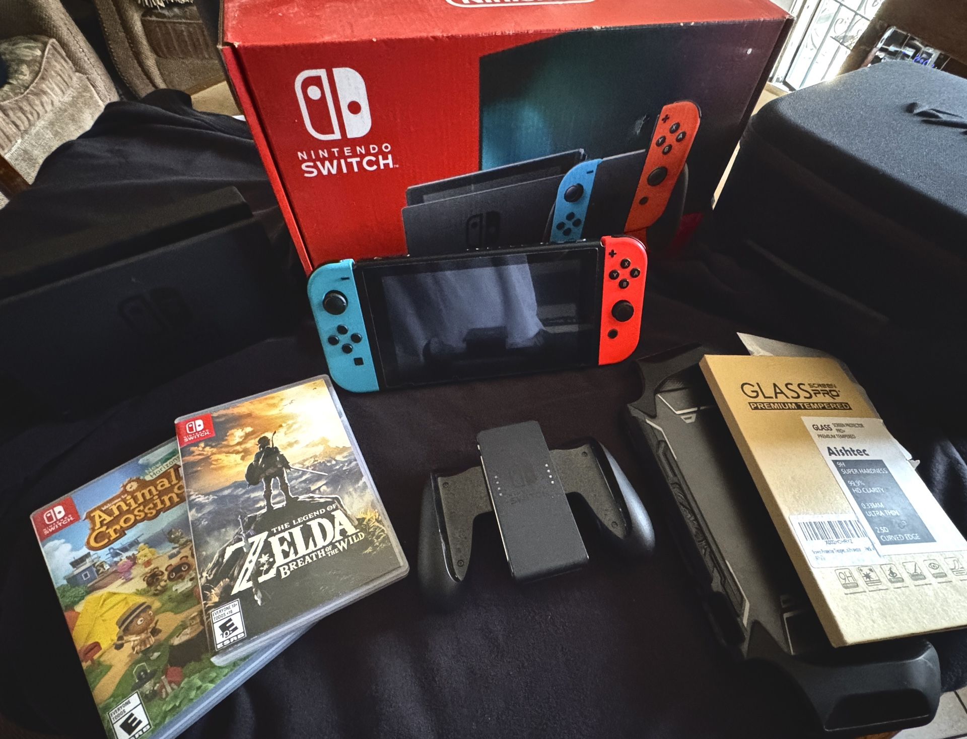 Nintendo Switch Bundle with Animal Crossing, Zelda: Breath of the Wild, and Accessories
