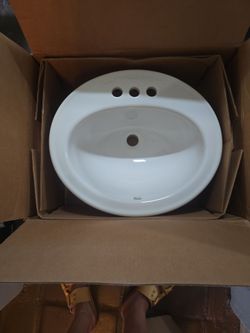Oval, drop in bathroom sink.