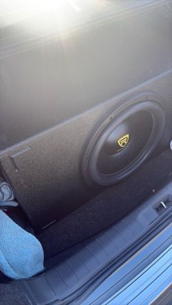 15 inch sub in box and a skar audio 2k watt