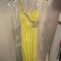 Lemon yellow long evening dress. New with tags. One-shoulder style with iridescent crystal detail.