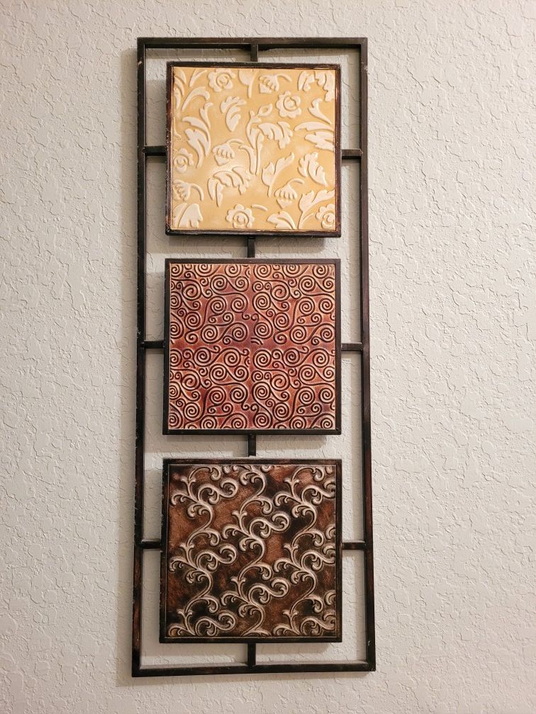 3 metal wall decors.