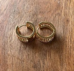 18K gold-plated hoop earrings with a Greek Key pattern and clear cubic zirconia