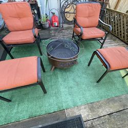 Metal patio set, includes chairs with cushions and fire pit, all in good condition