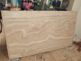 This is a Travertine dinning table from Italy  and the stand it comes with is also Travertine. Chairs are not included